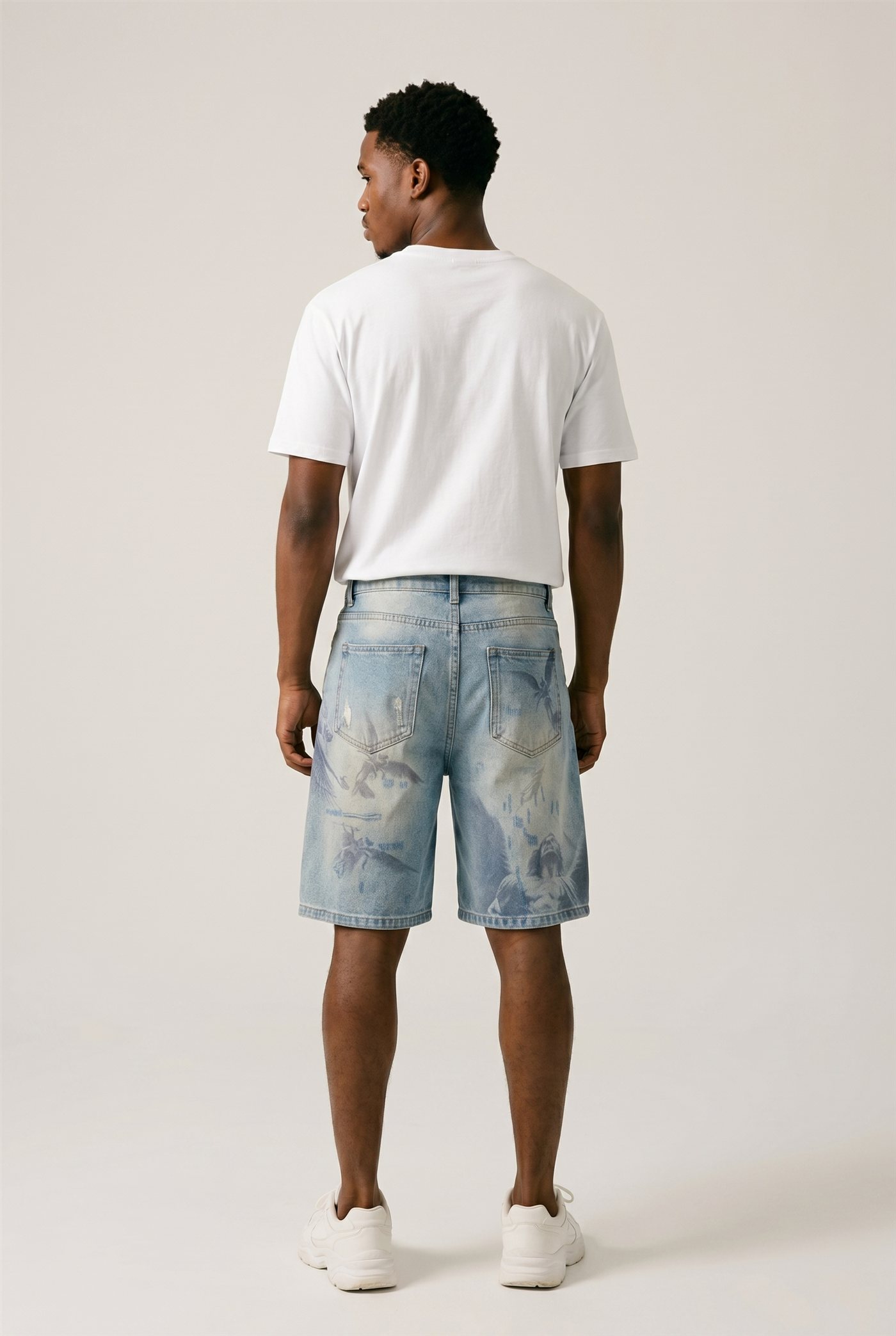 Denim jorts e-commerce back shot — clean studio backdrop, ASOS-style
